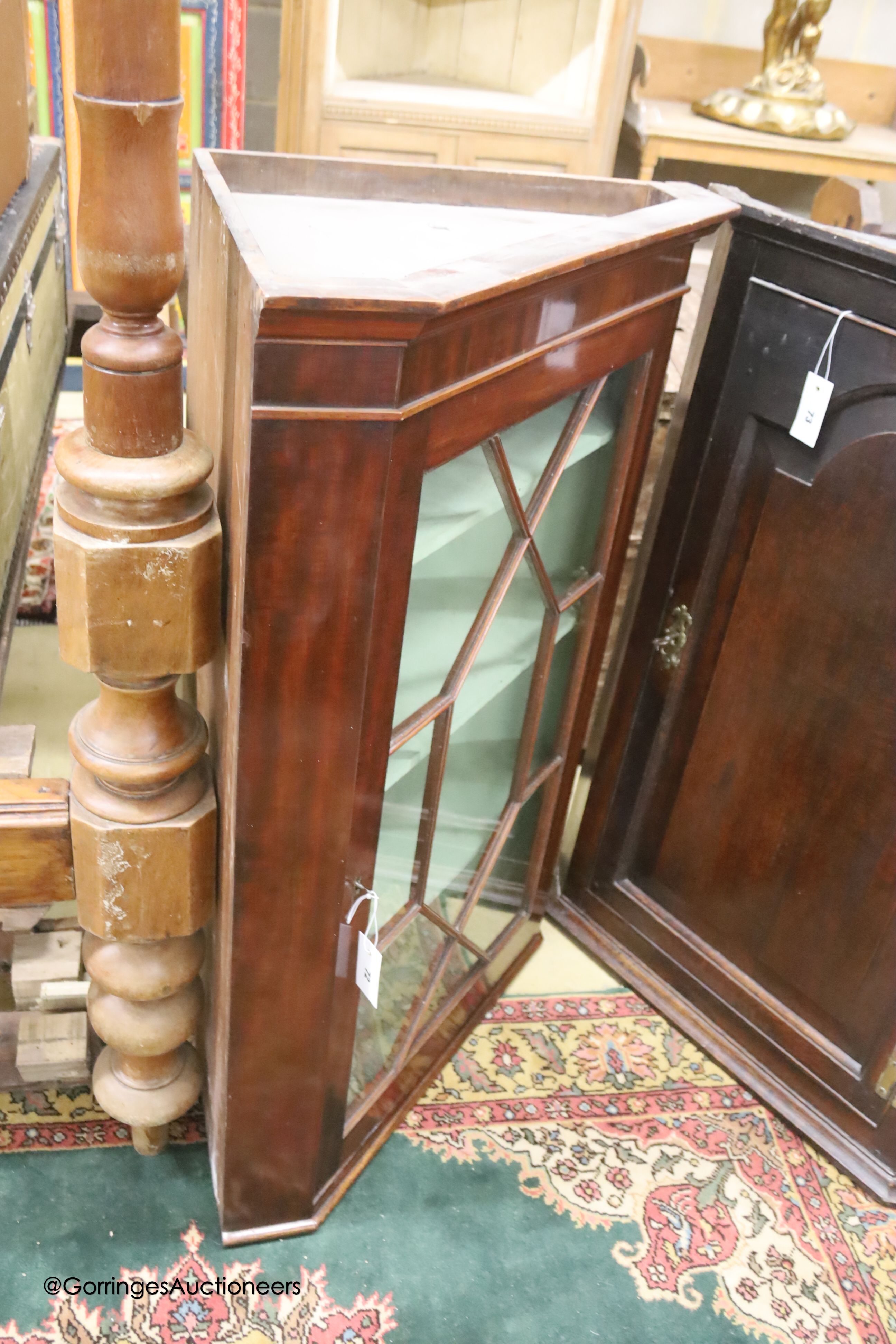 A George III mahogany astragal glazed hanging corner cabinet, width 73cm, depth 44cm, height 101cm